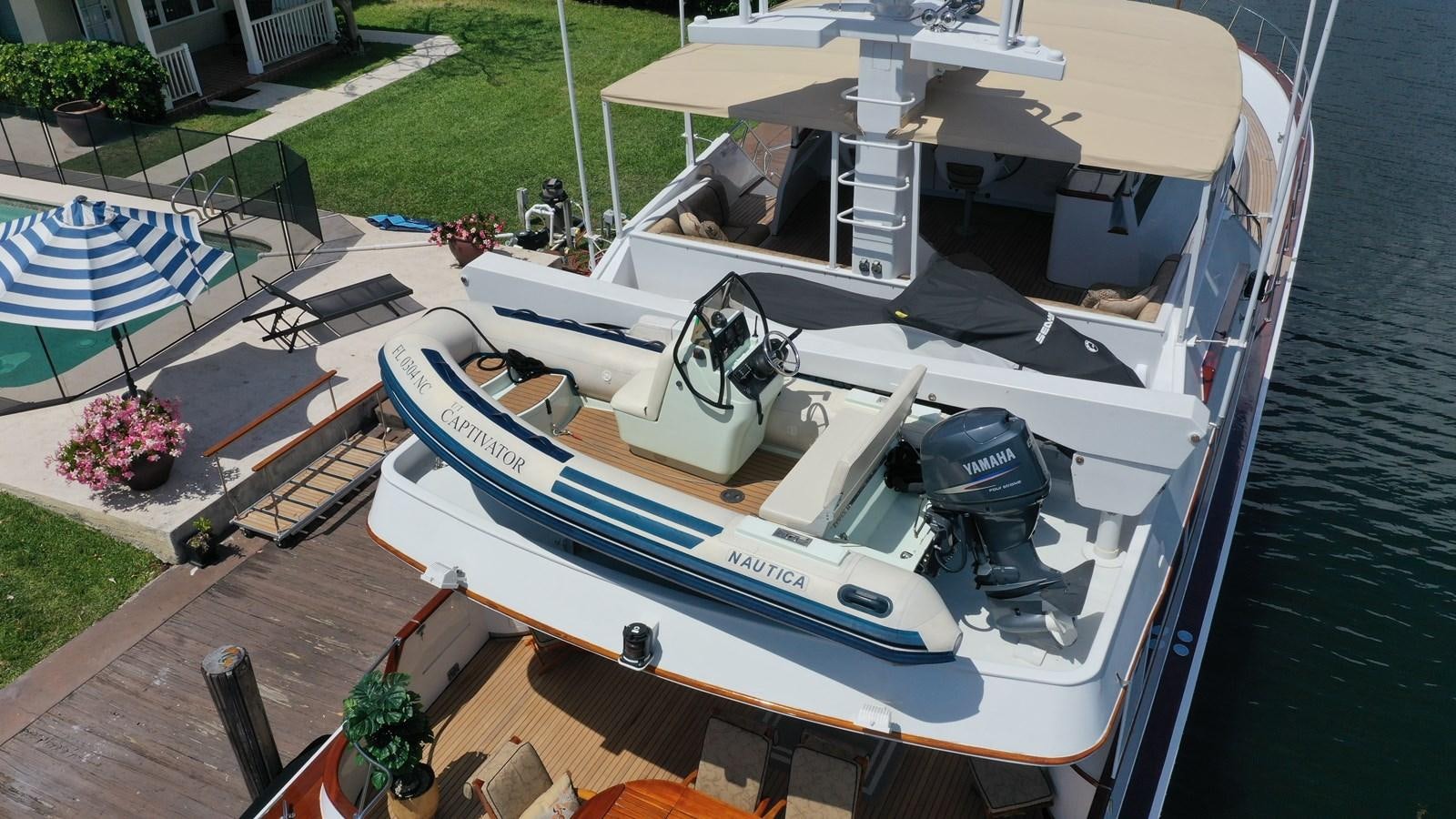 a boat on the water aboard CAPTIVATOR Yacht for Sale