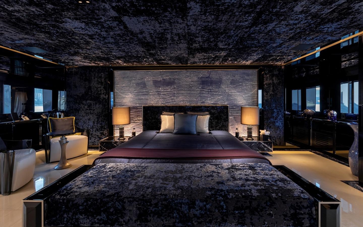 a bed in a room aboard SARASTAR Yacht for Sale