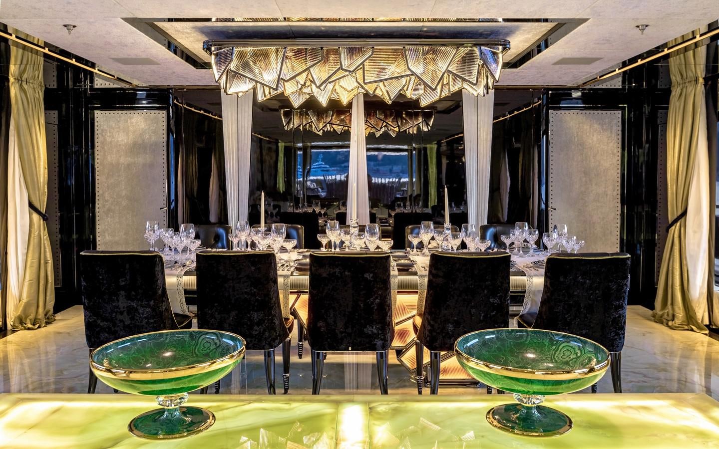 a group of chairs and a table aboard SARASTAR Yacht for Sale