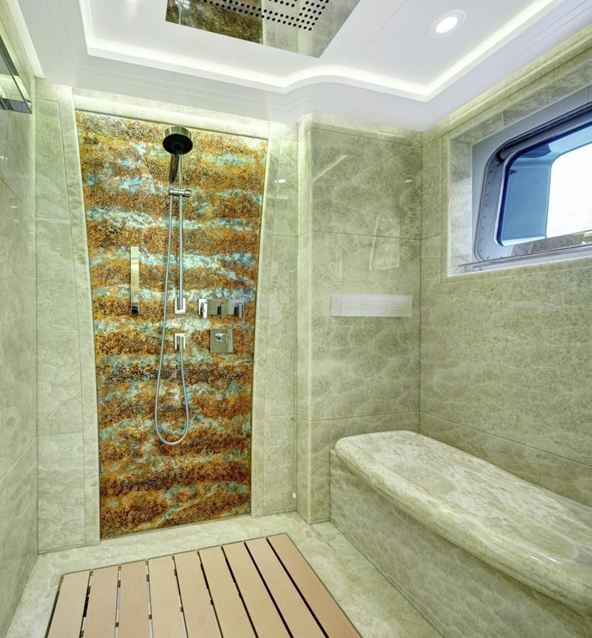 a shower unit in a bathroom aboard SALVAJE Yacht for Charter