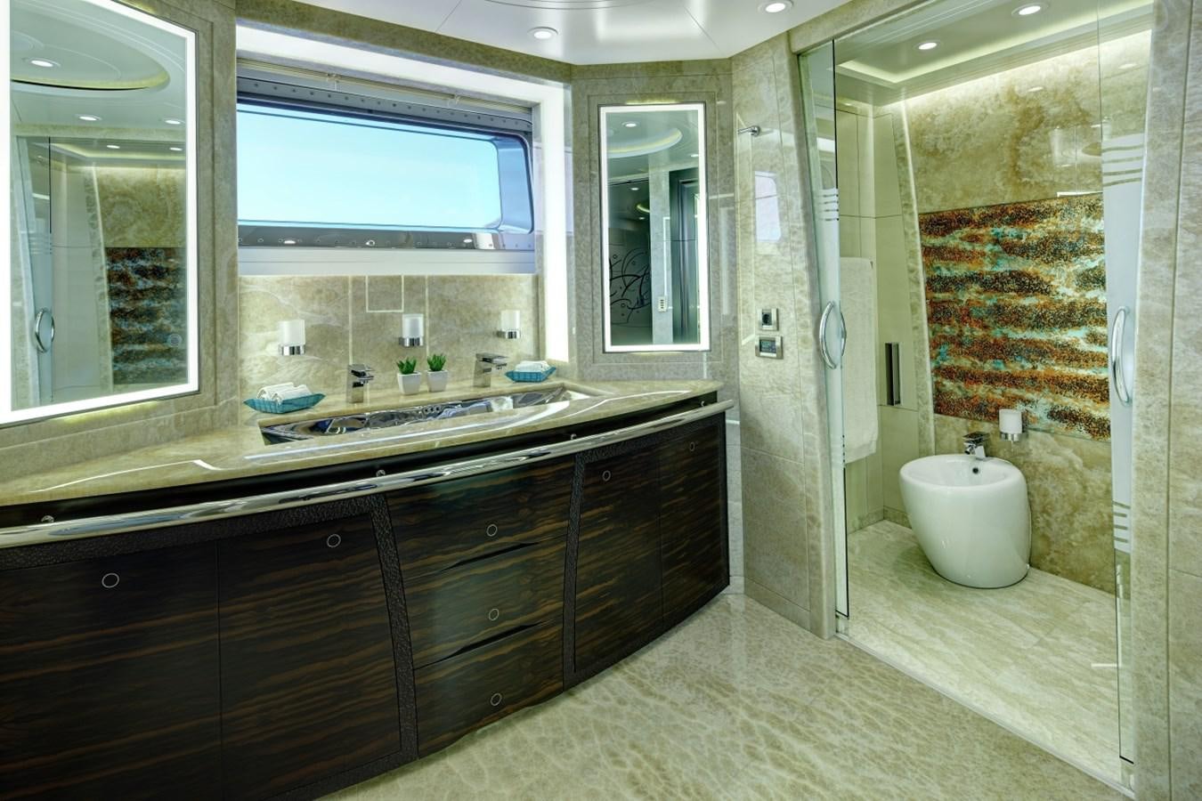 a bathroom with a large window aboard SALVAJE Yacht for Charter