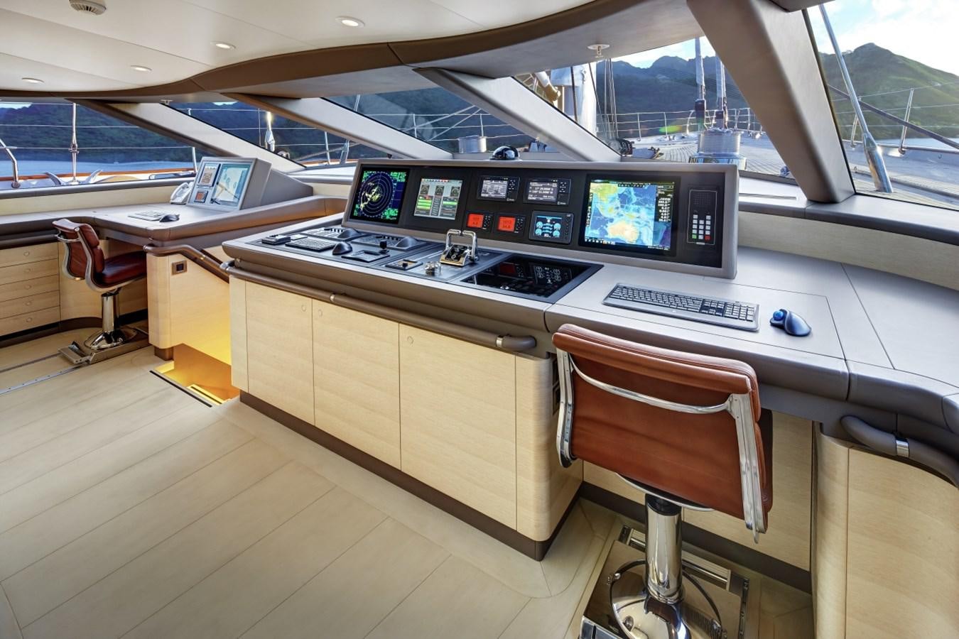 a control room with computers aboard SALVAJE Yacht for Charter