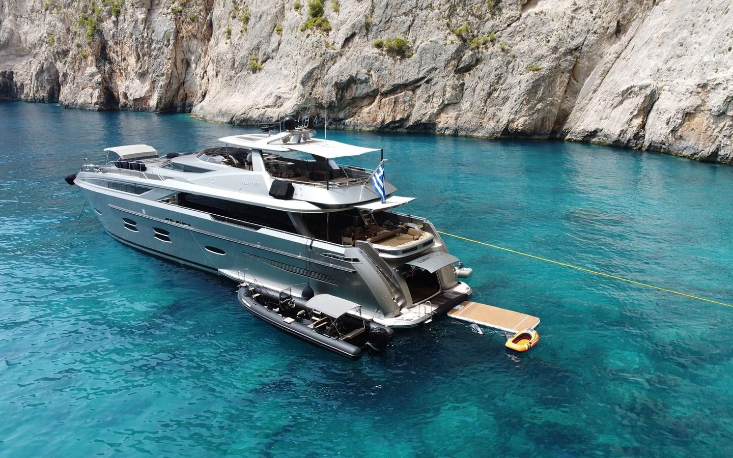 a boat tied to a dock aboard FUNKY CHOICE Yacht for Sale