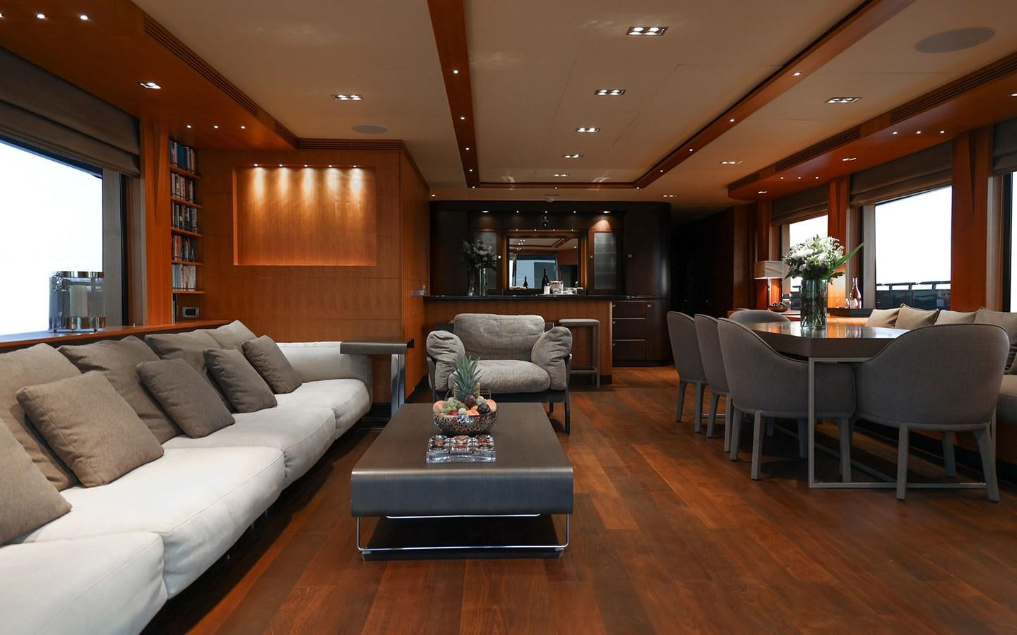 a living room with a couch and a table aboard FUNKY CHOICE Yacht for Sale