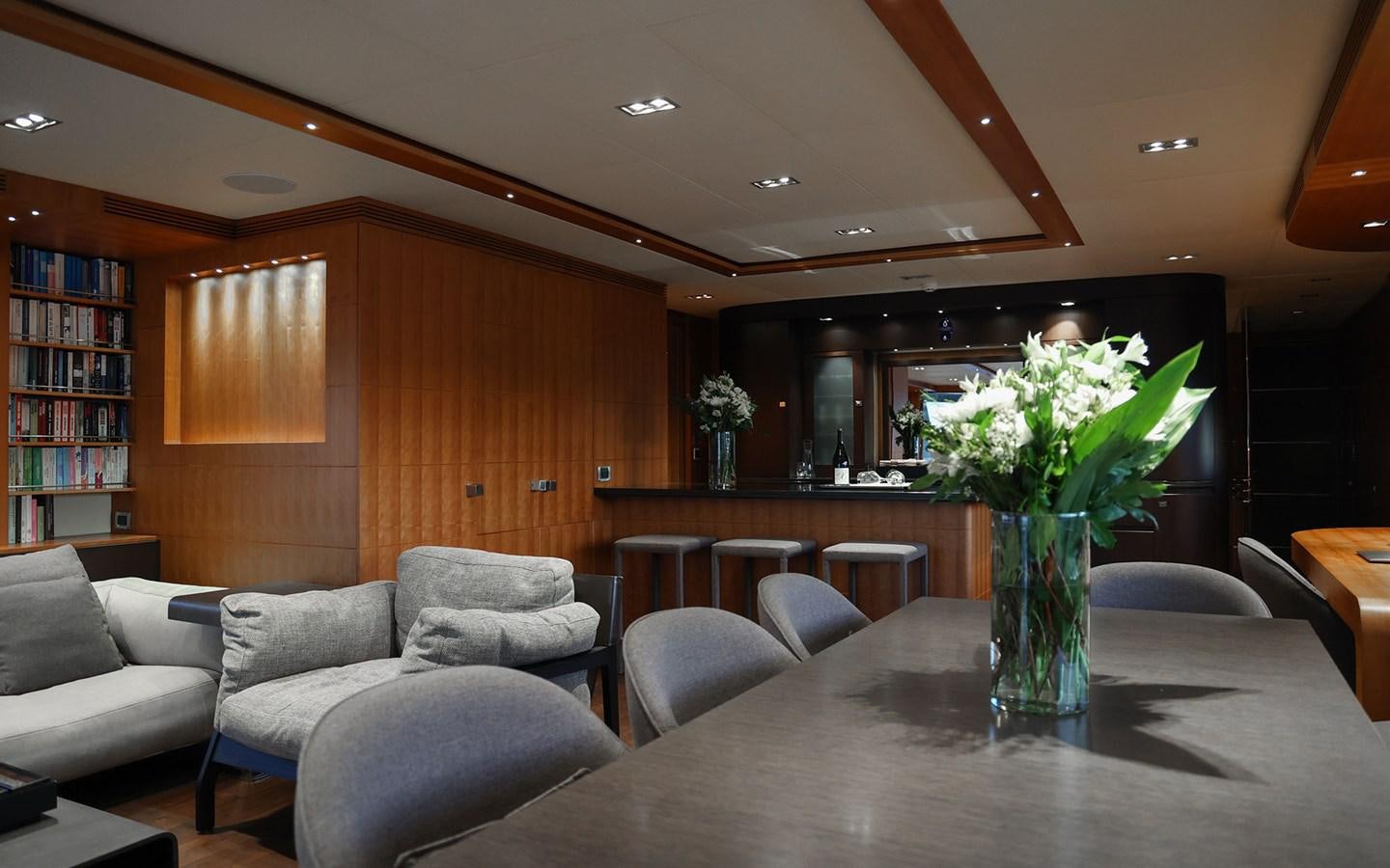 a vase of flowers on a table aboard FUNKY CHOICE Yacht for Sale
