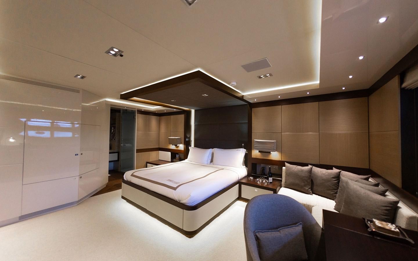 a room with a bed and a couch aboard FUNKY CHOICE Yacht for Sale