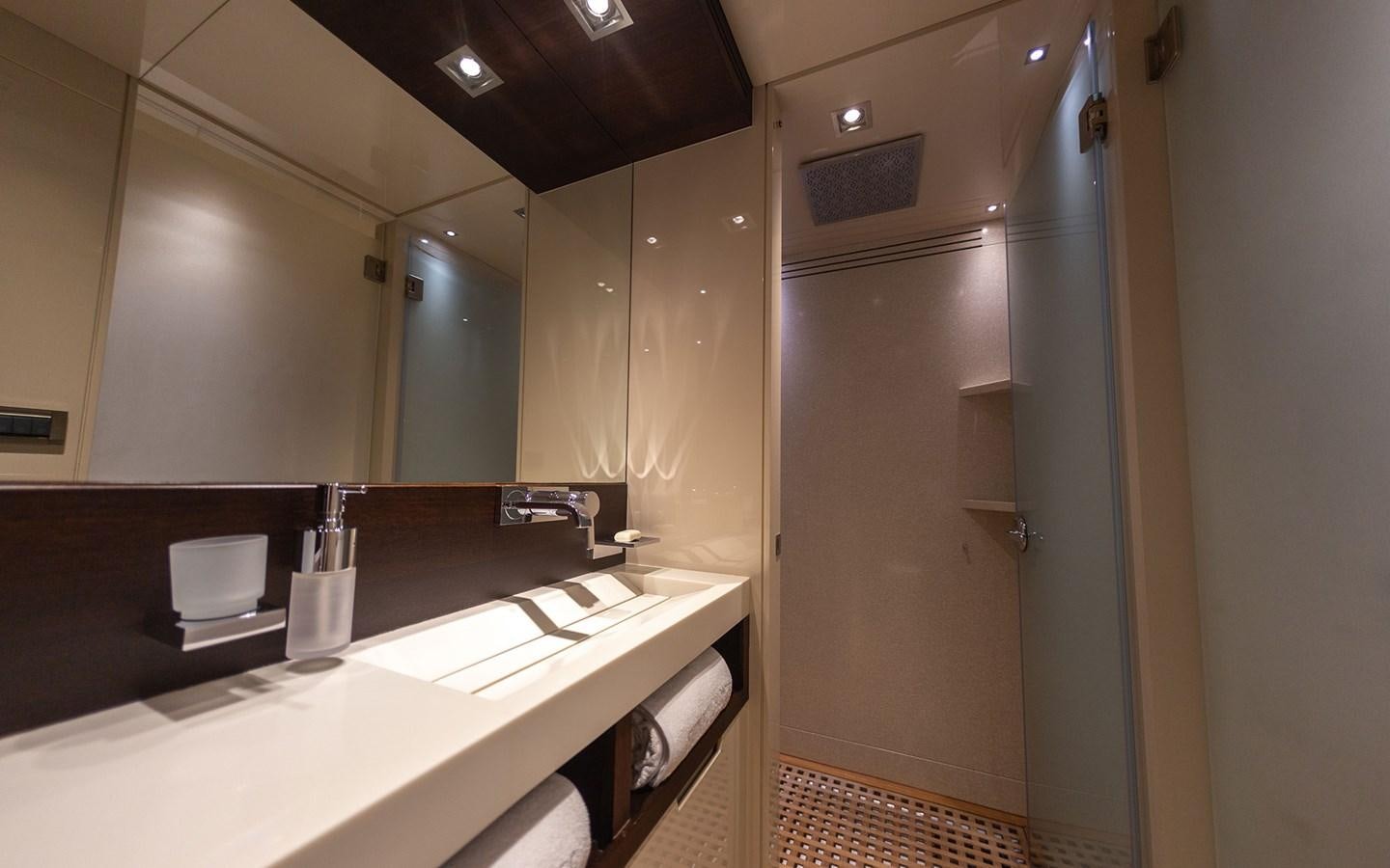 a bathroom with sinks and mirrors aboard FUNKY CHOICE Yacht for Sale
