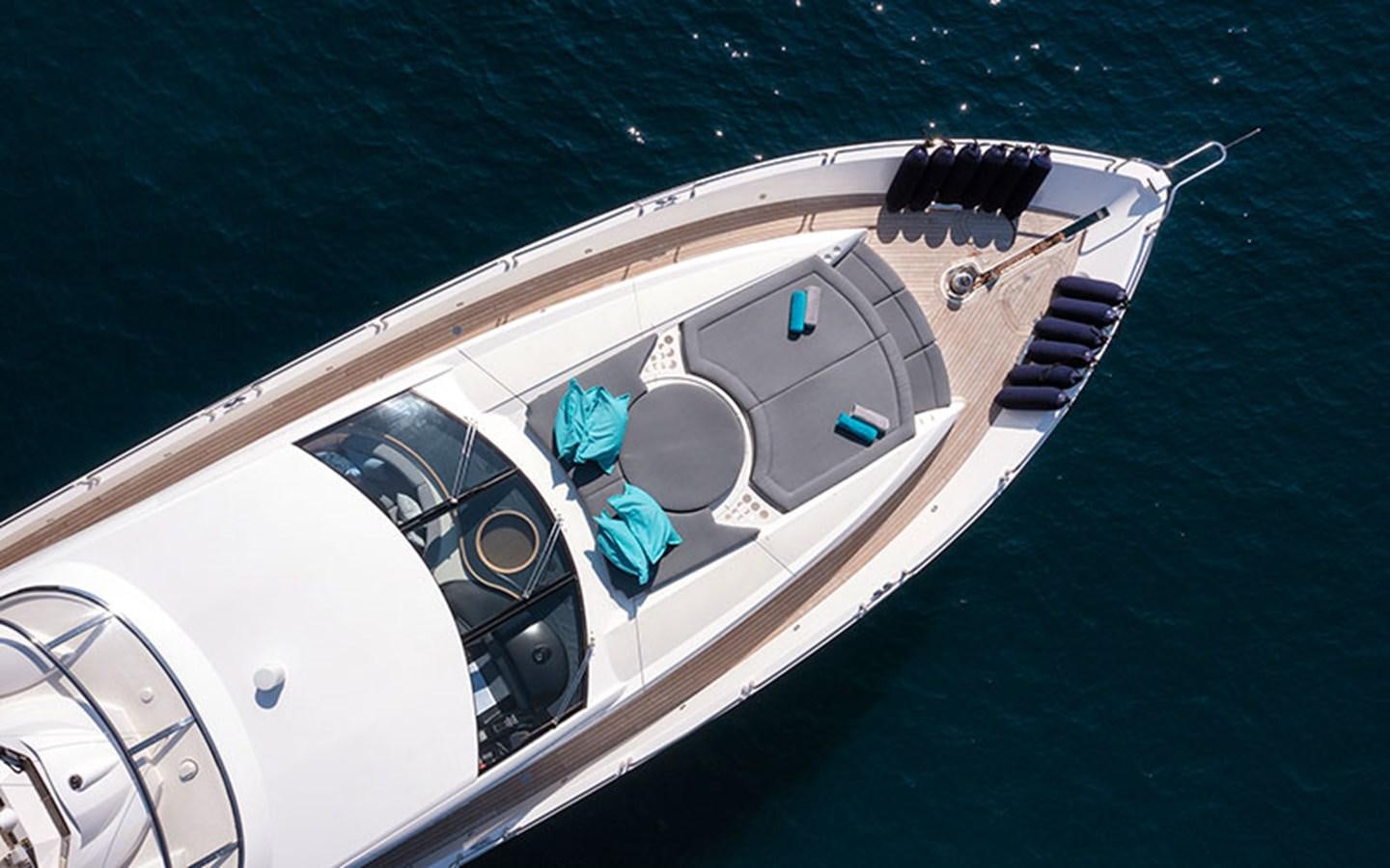 a person sitting on a boat aboard EXCELERATE Z Yacht for Sale