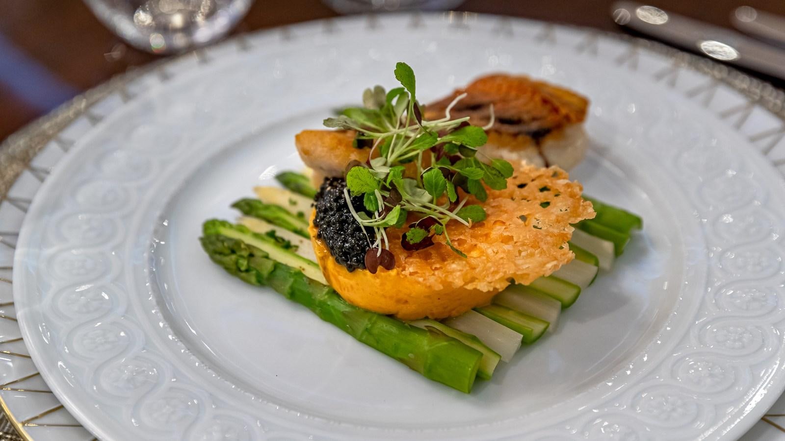 a plate of food aboard MARGUERITE Yacht for Charter