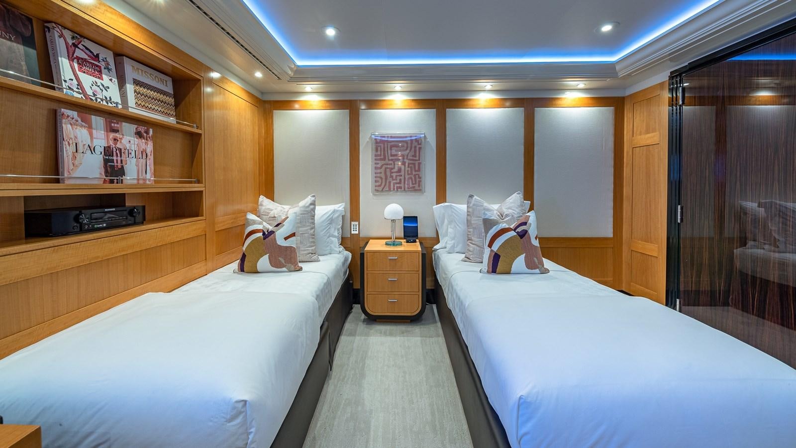 a room with two beds aboard MARGUERITE Yacht for Charter