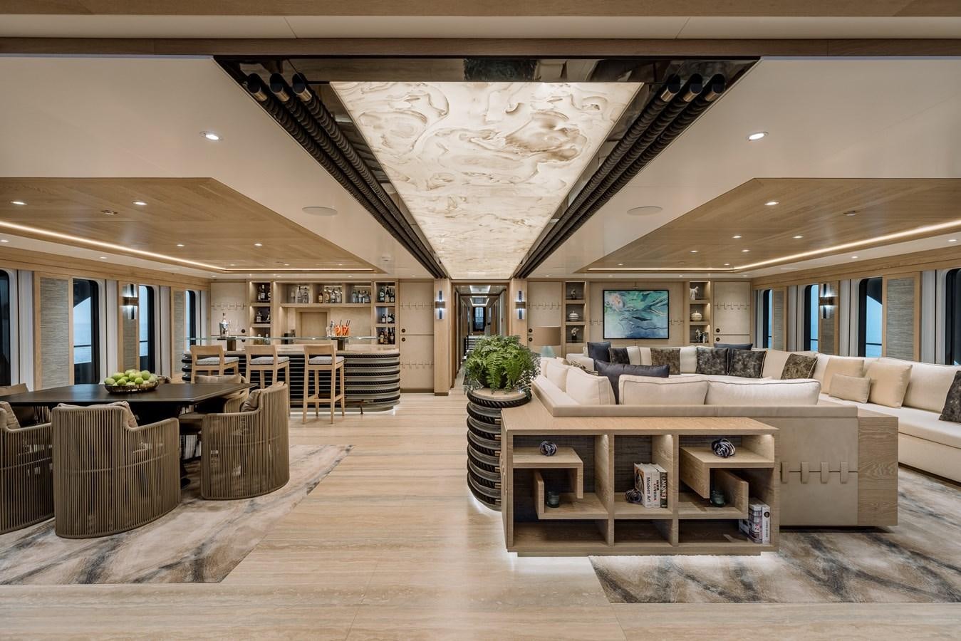 a large living room with a large white ceiling aboard VICTORIOUS Yacht for Charter