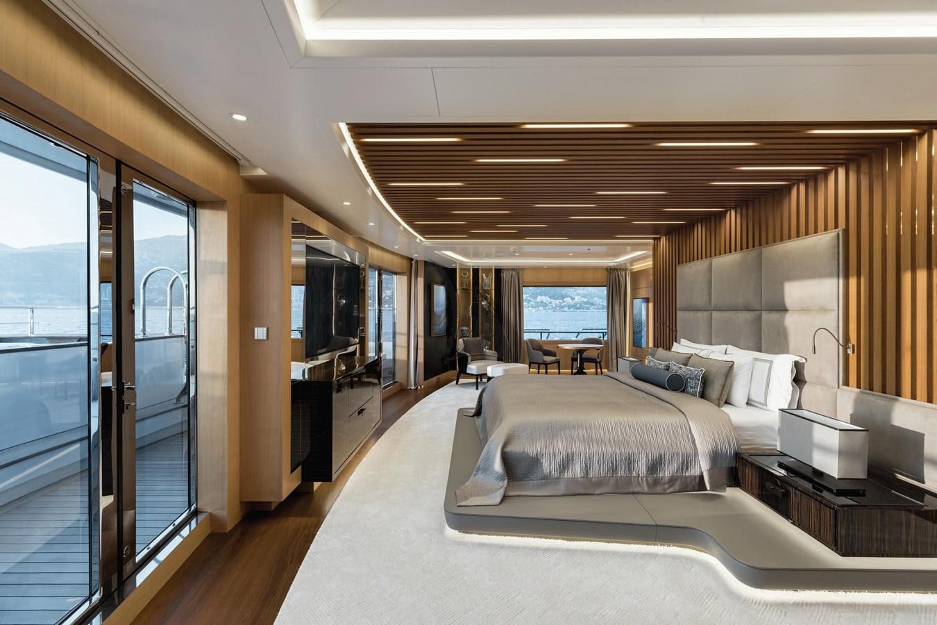 a hotel room with a large bed aboard VICTORIOUS Yacht for Charter