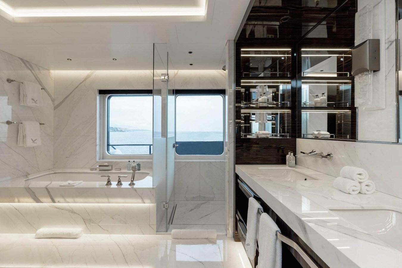 a bathroom with a sink and cabinets aboard VICTORIOUS Yacht for Charter
