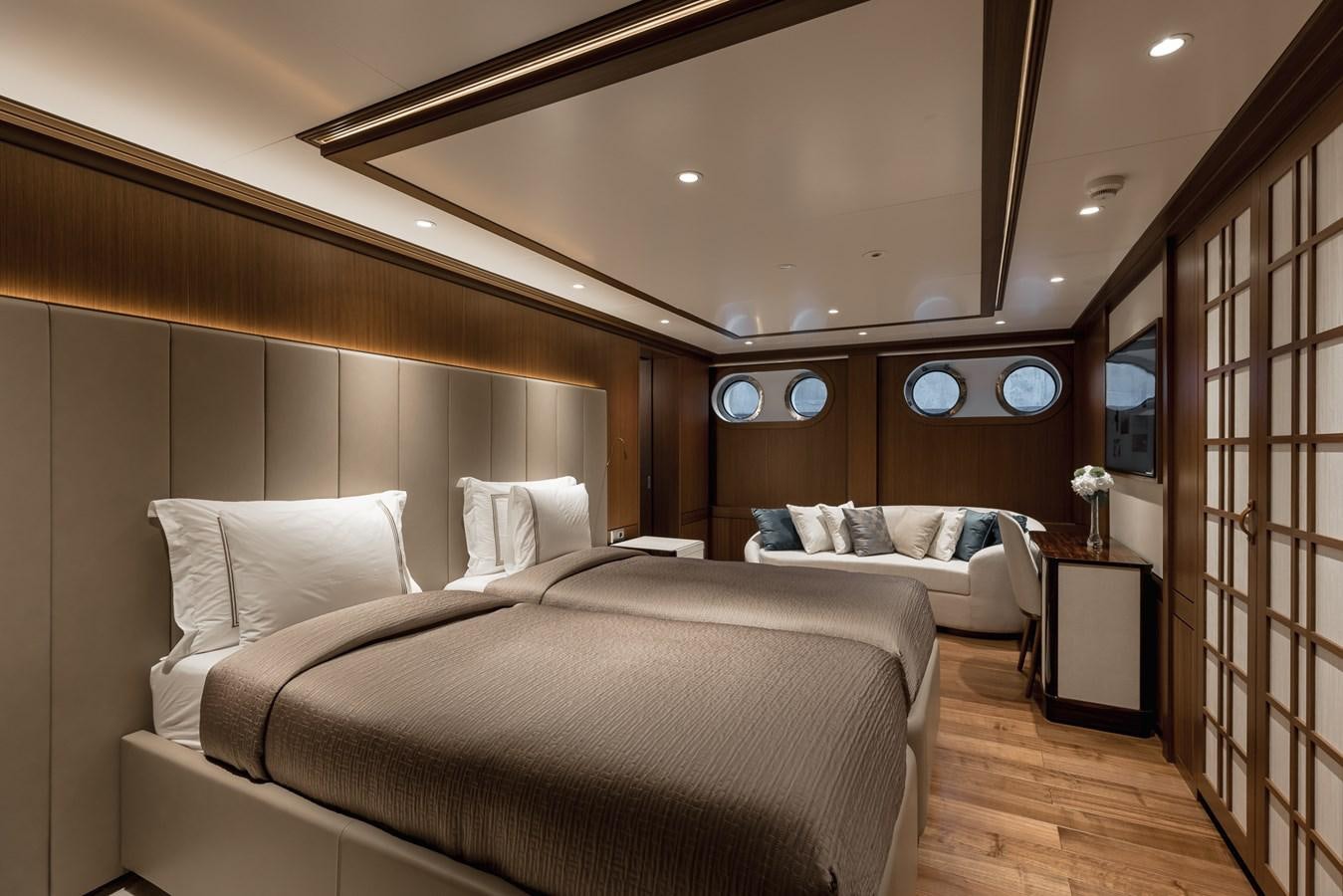 a room with two beds aboard VICTORIOUS Yacht for Charter