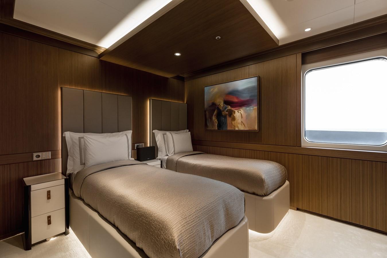a room with two beds aboard VICTORIOUS Yacht for Charter