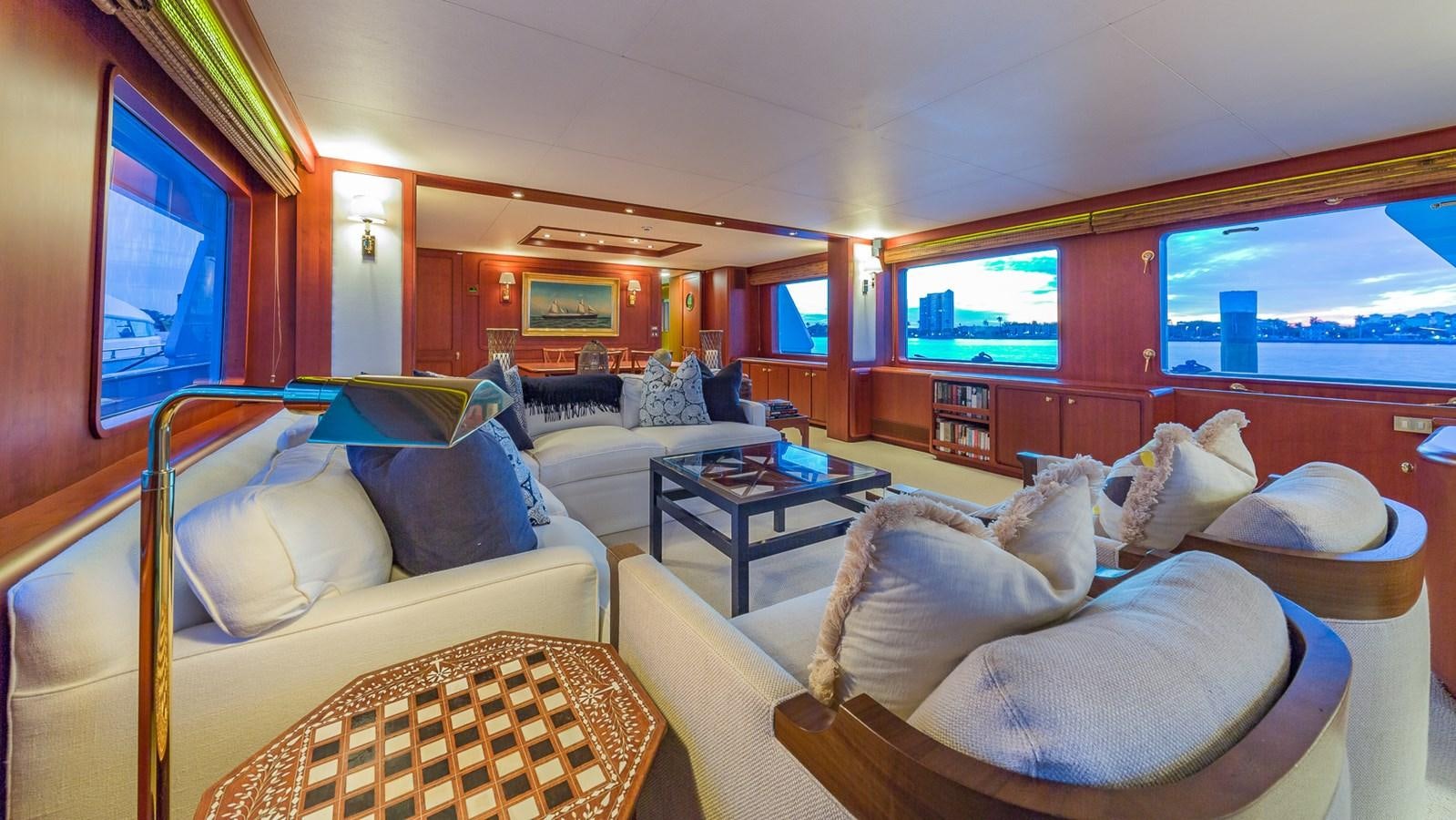 a room with a couch and a television aboard CASUAL WATER Yacht for Sale