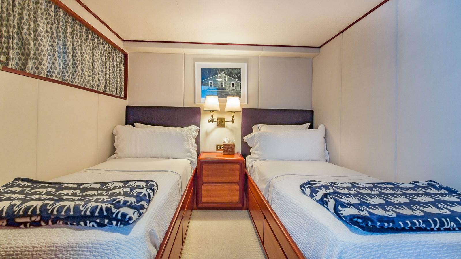 a couple of beds in a hotel room aboard CASUAL WATER Yacht for Sale