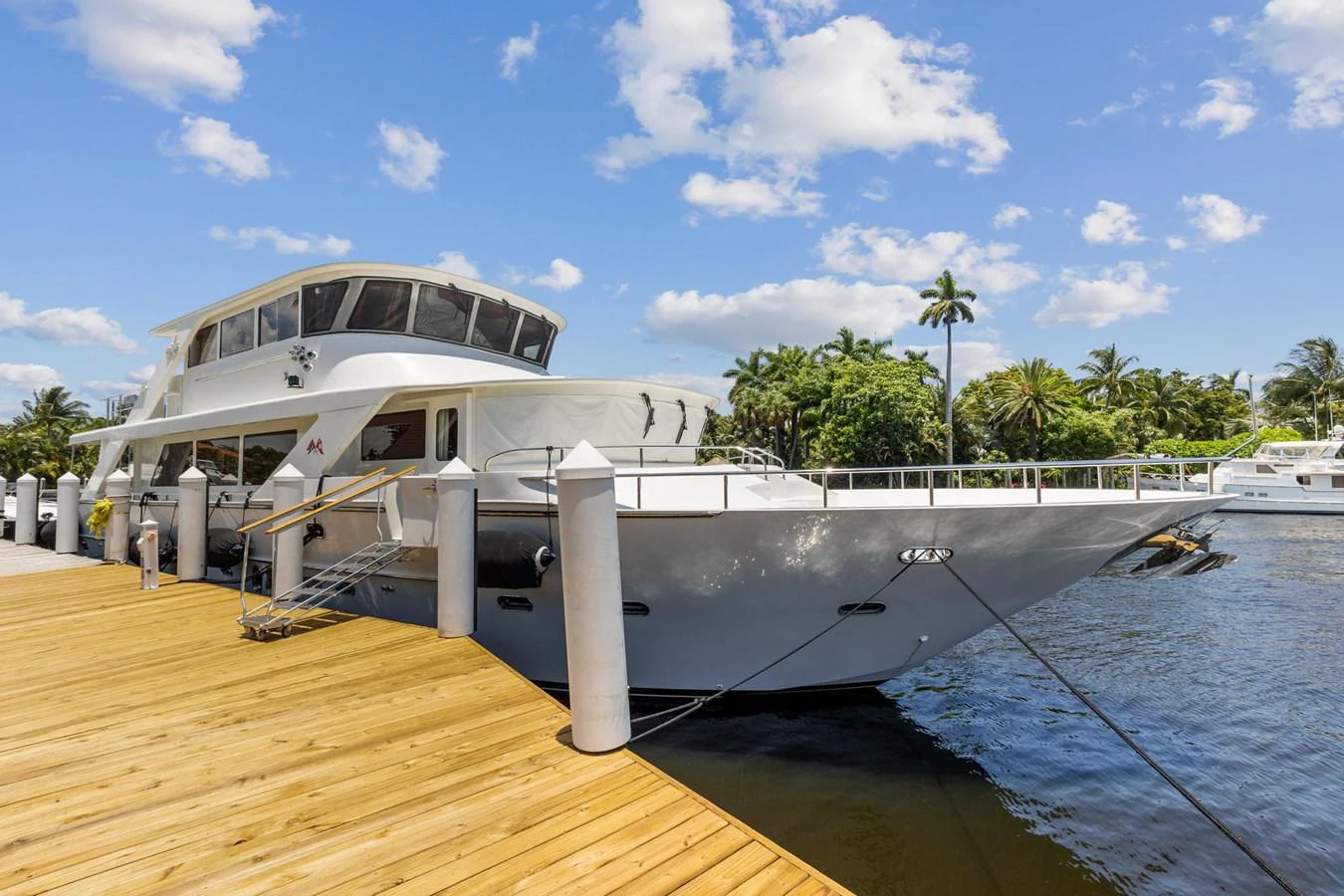 a boat docked at a pier aboard JEF82110L506 Yacht for Sale