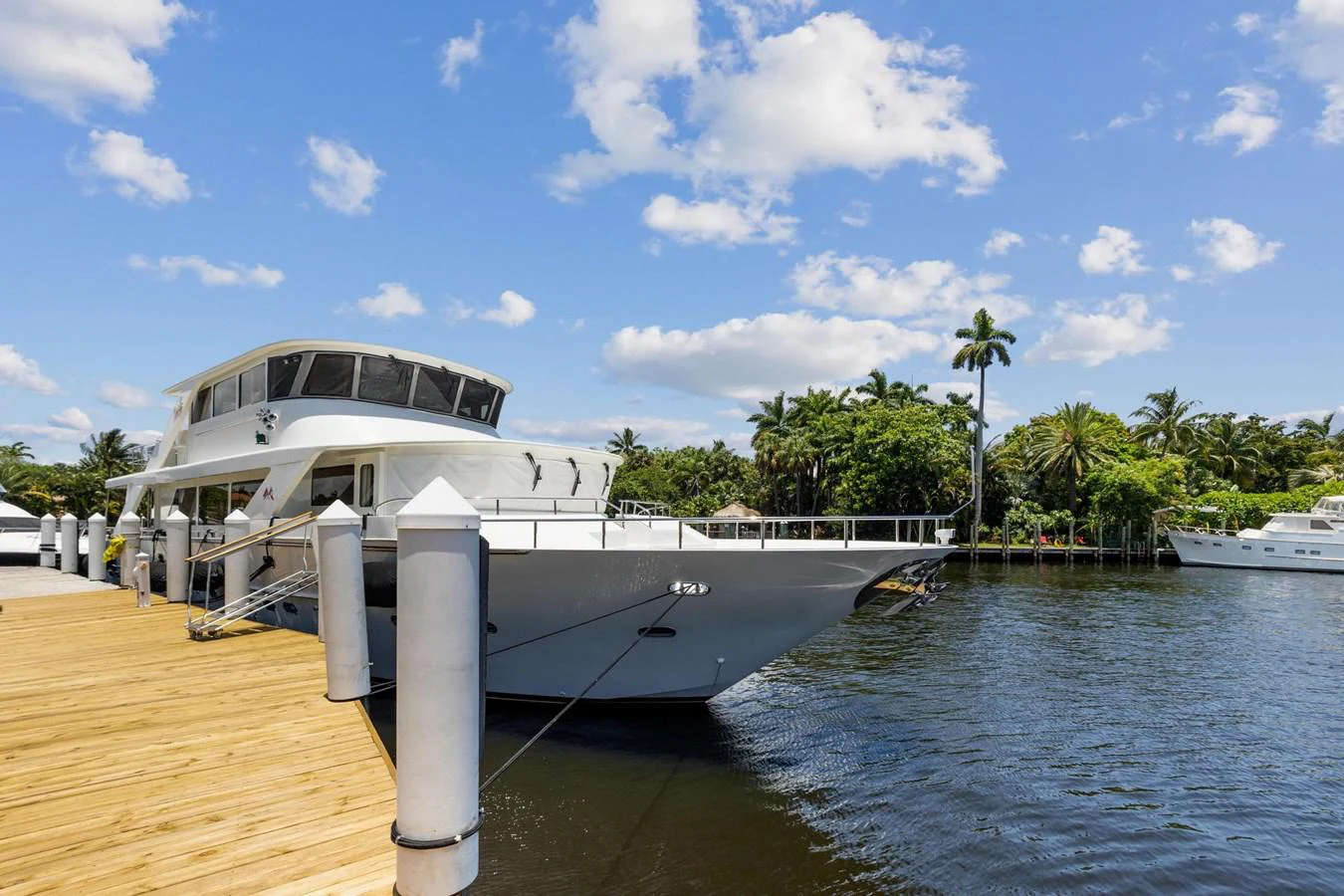 a boat docked at a pier aboard JEF82110L506 Yacht for Sale