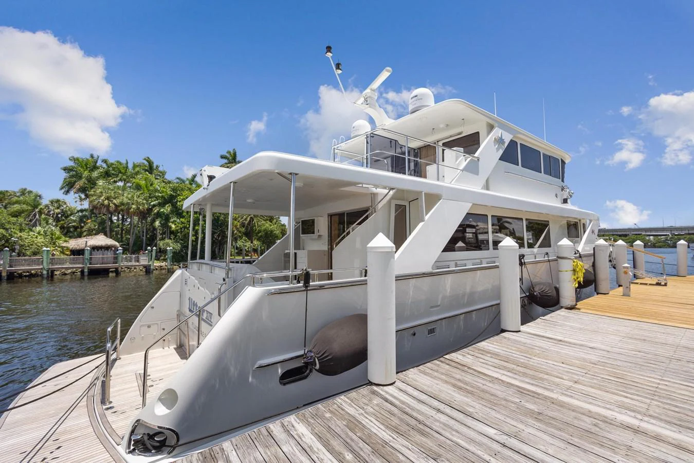 a boat docked at a pier aboard JEF82110L506 Yacht for Sale