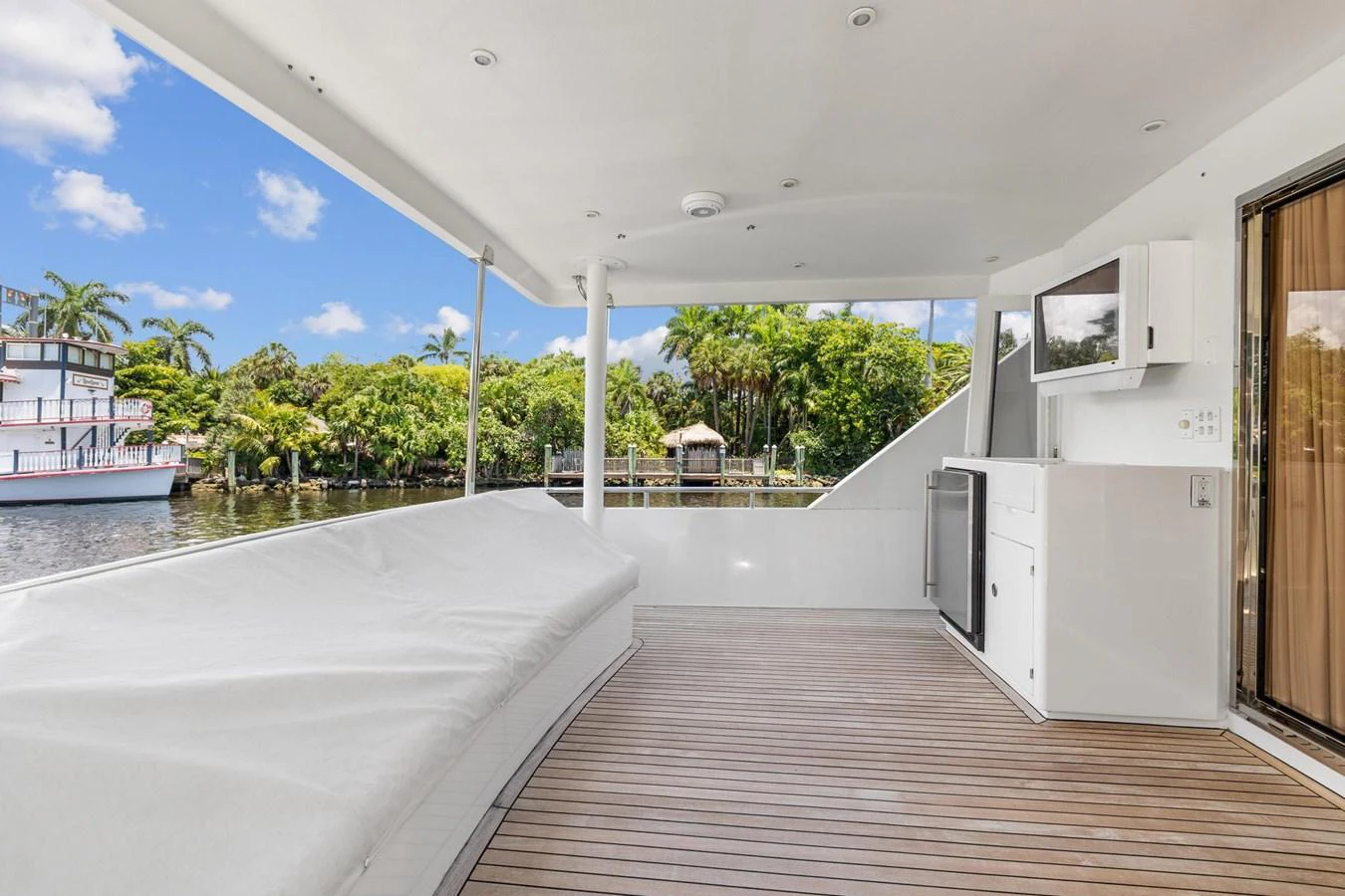 a large white pool with a deck and a deck and a pool aboard JEF82110L506 Yacht for Sale
