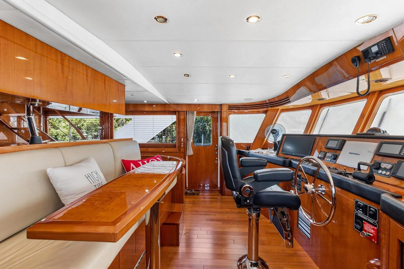 a room with a table and chairs aboard JEF82110L506 Yacht for Sale