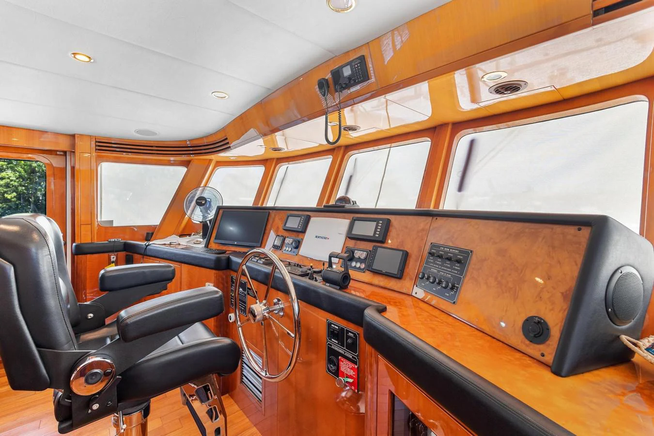a room with a desk and chairs aboard JEF82110L506 Yacht for Sale
