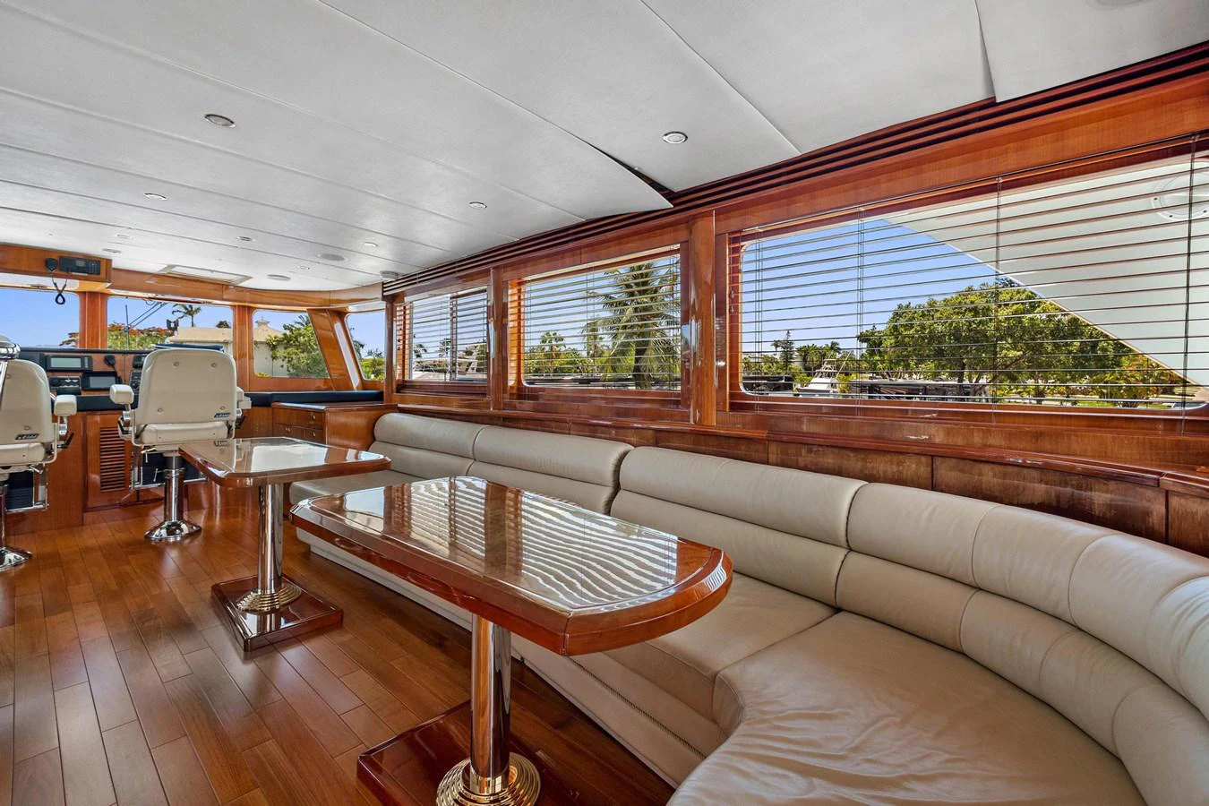 a room with a table and chairs aboard JEF82110L506 Yacht for Sale