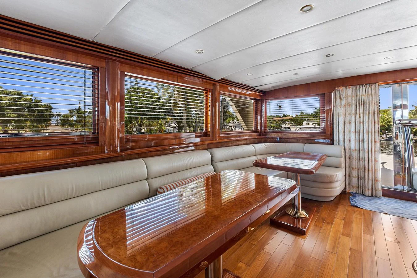 a living room with a couch and a table aboard JEF82110L506 Yacht for Sale