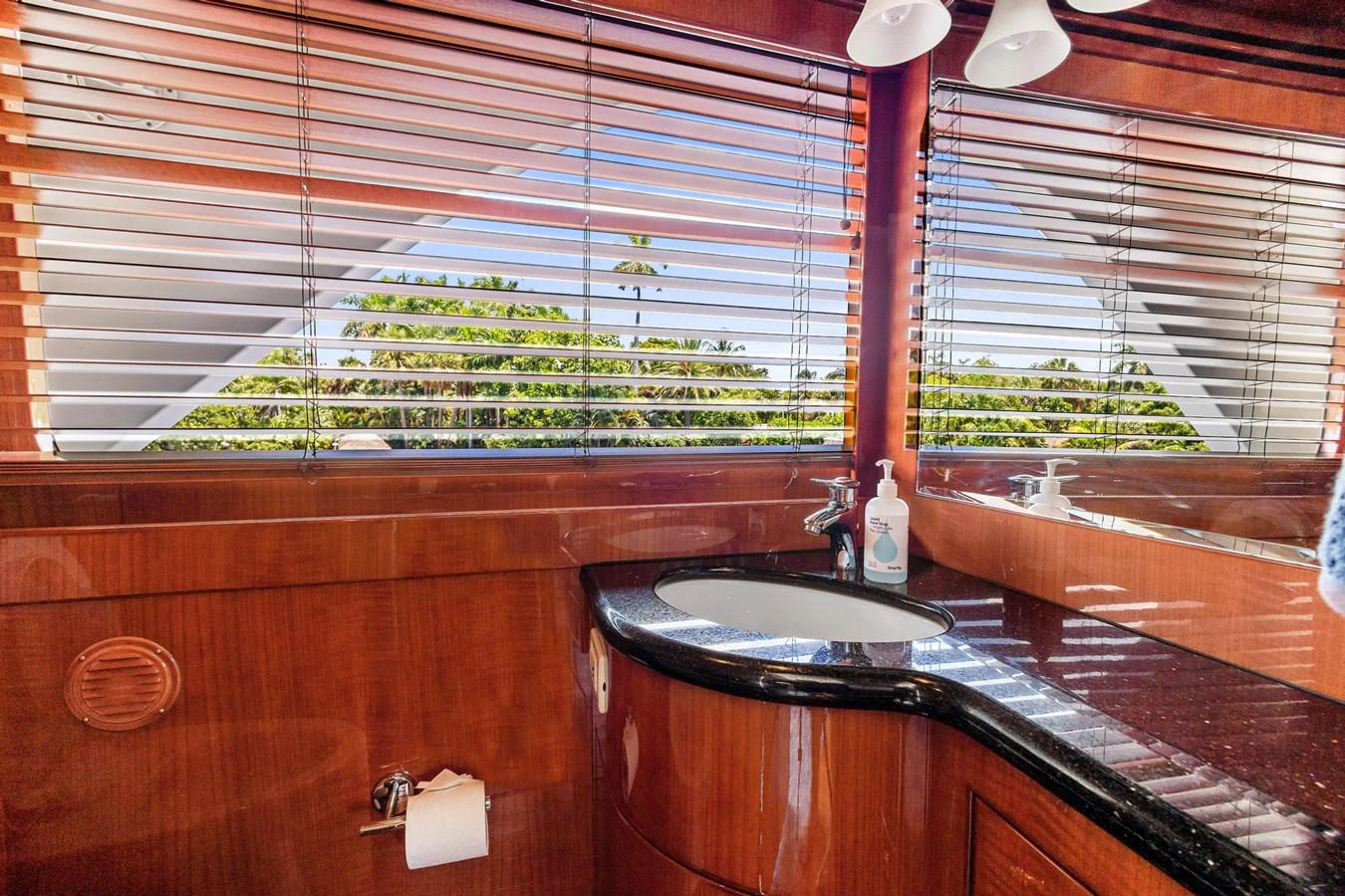 a bathroom with a sink and a window aboard JEF82110L506 Yacht for Sale