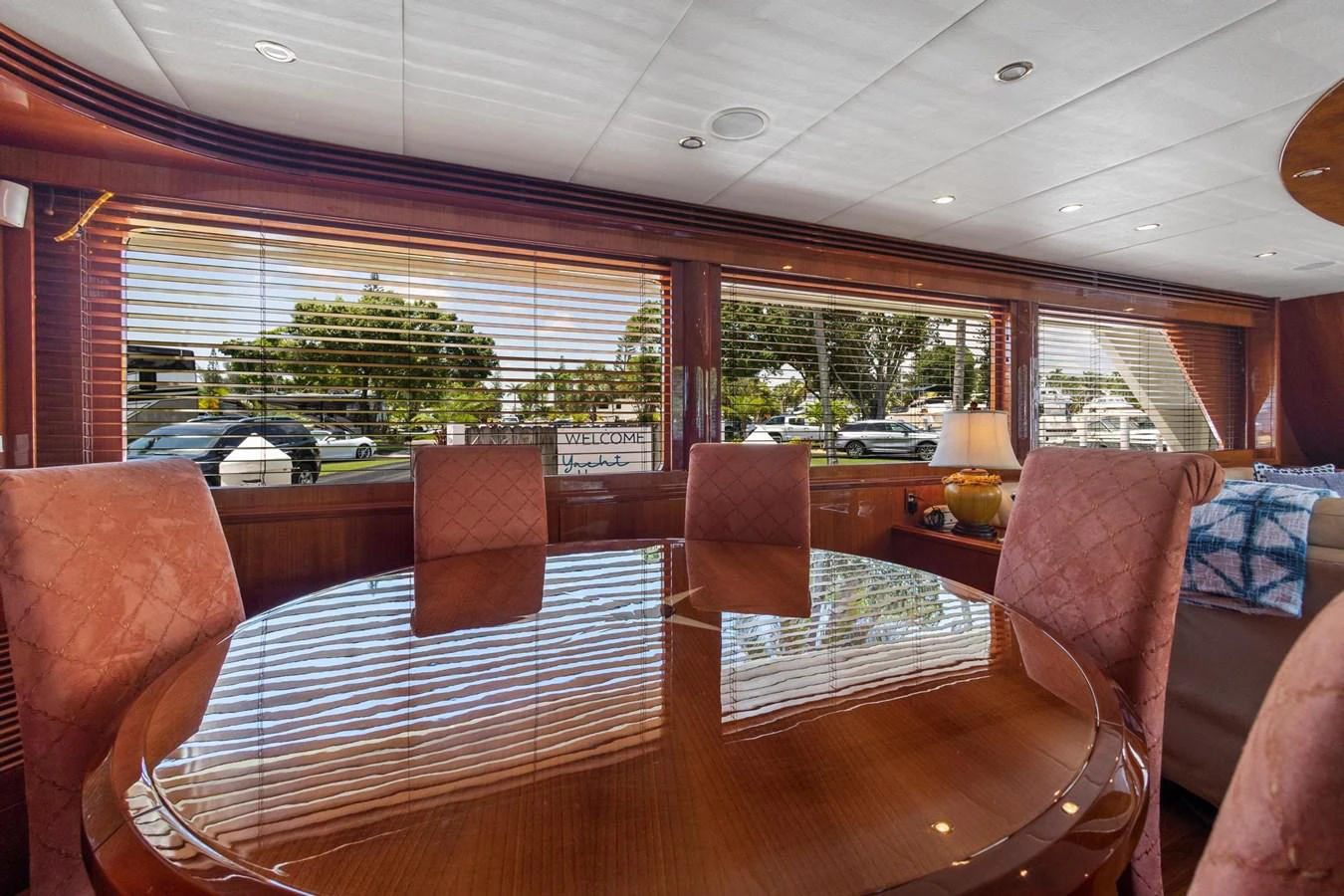 a room with a couch and a table and chairs aboard JEF82110L506 Yacht for Sale