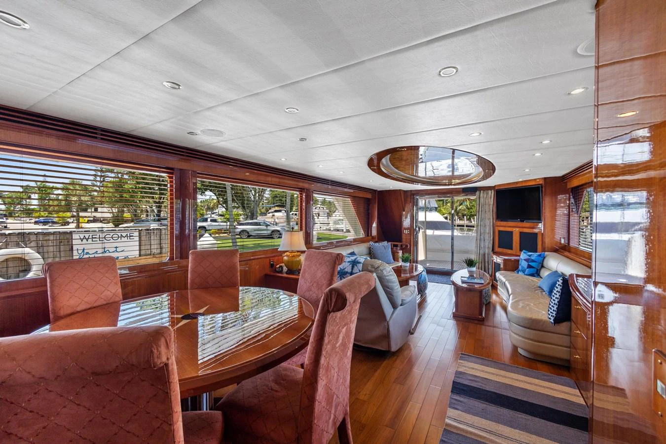 a living room with a large window aboard JEF82110L506 Yacht for Sale