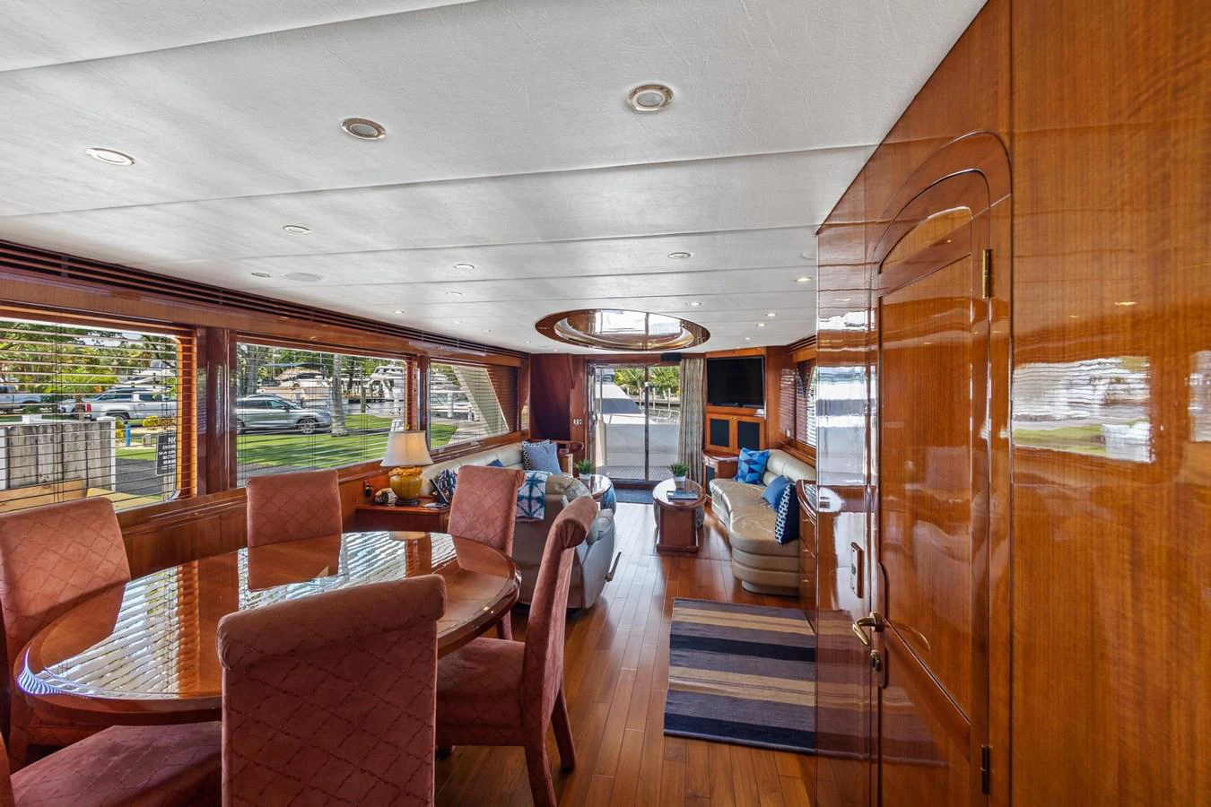 a cabin with a deck and chairs aboard JEF82110L506 Yacht for Sale