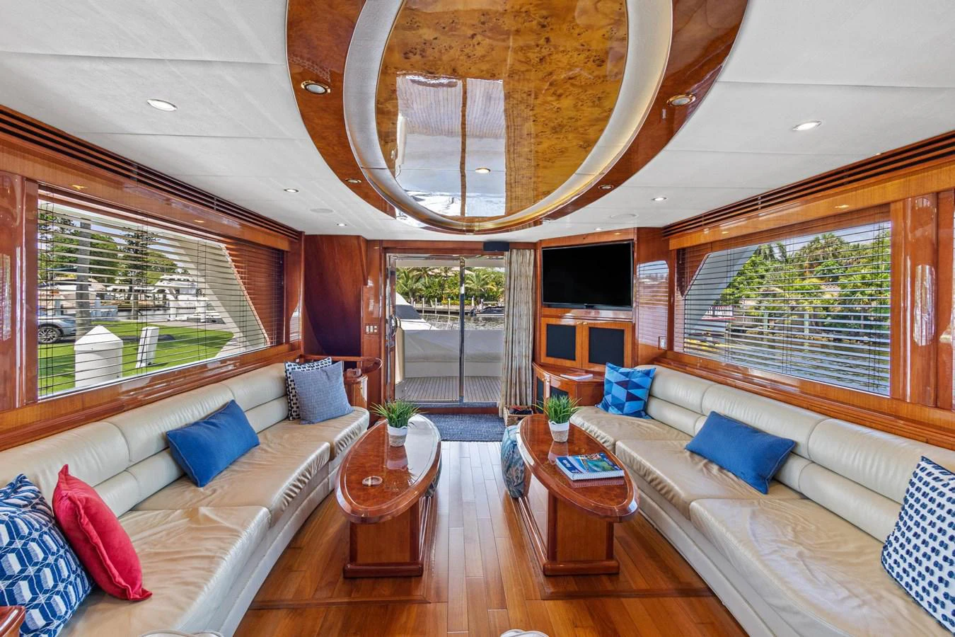 a living room with a large window aboard JEF82110L506 Yacht for Sale
