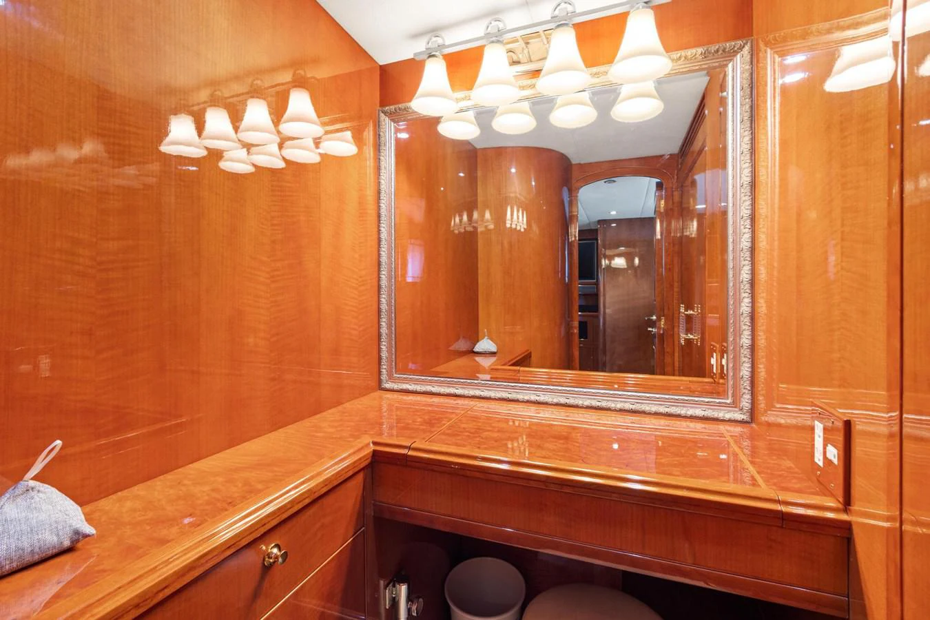 a bathroom with a large mirror aboard JEF82110L506 Yacht for Sale