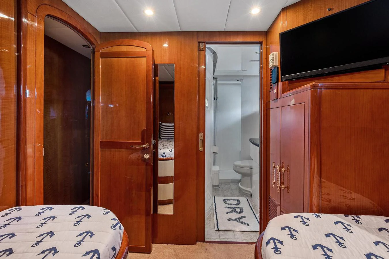 a room with a bed and a television aboard JEF82110L506 Yacht for Sale
