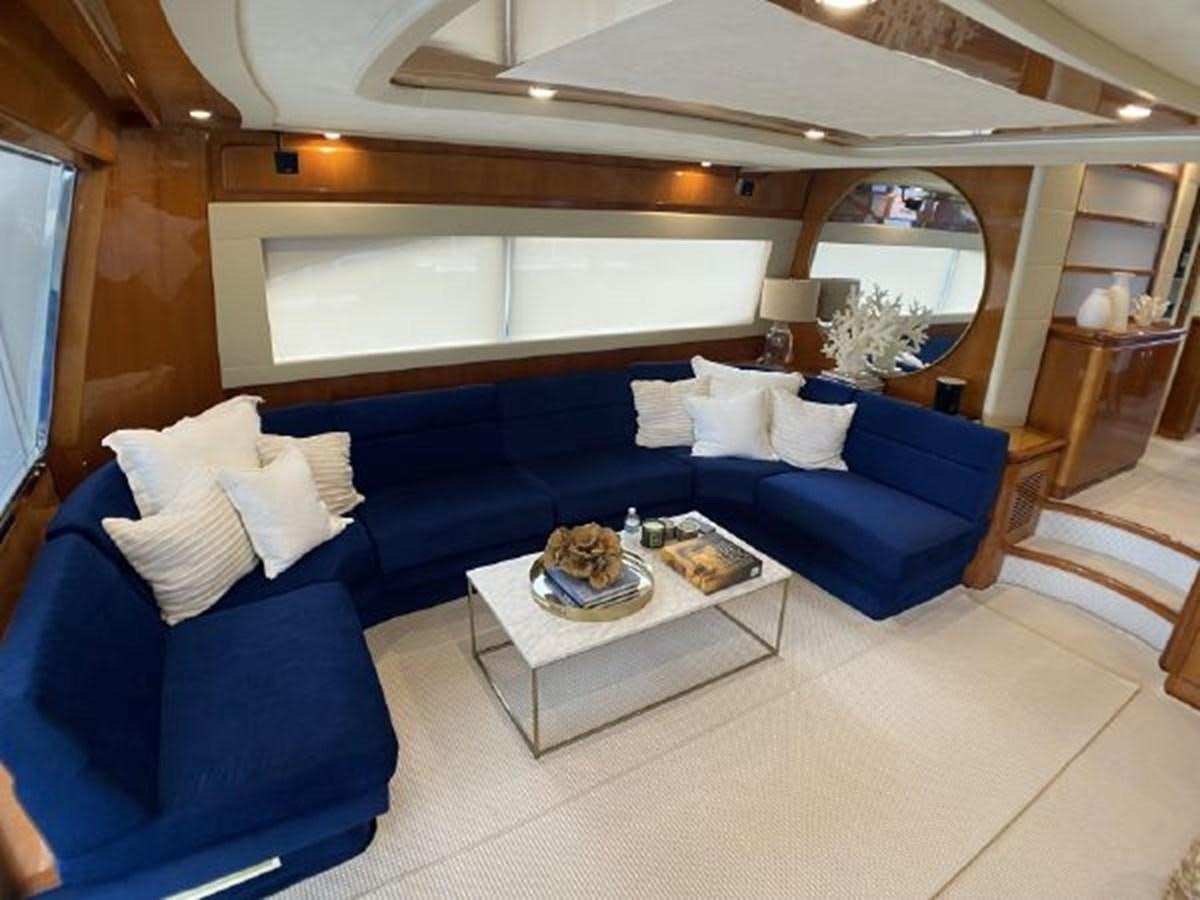 a modern looking living room aboard 2005 760 FERRETTI MOTOR YACHT Yacht for Sale