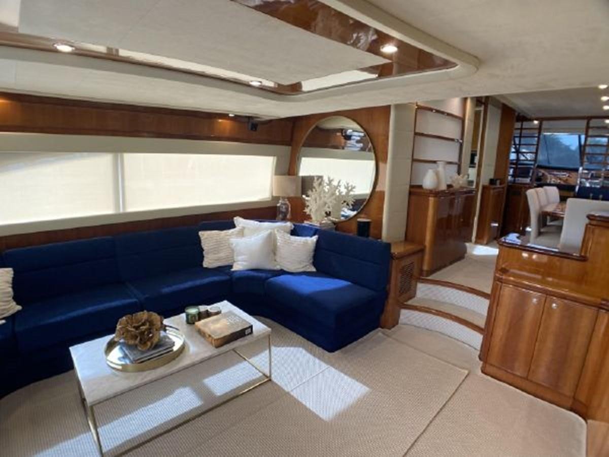 a modern looking living room aboard 2005 760 FERRETTI MOTOR YACHT Yacht for Sale