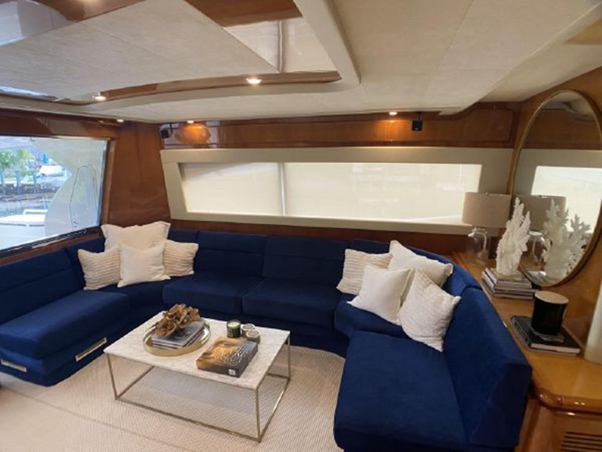 a modern looking living room aboard 2005 760 FERRETTI MOTOR YACHT Yacht for Sale