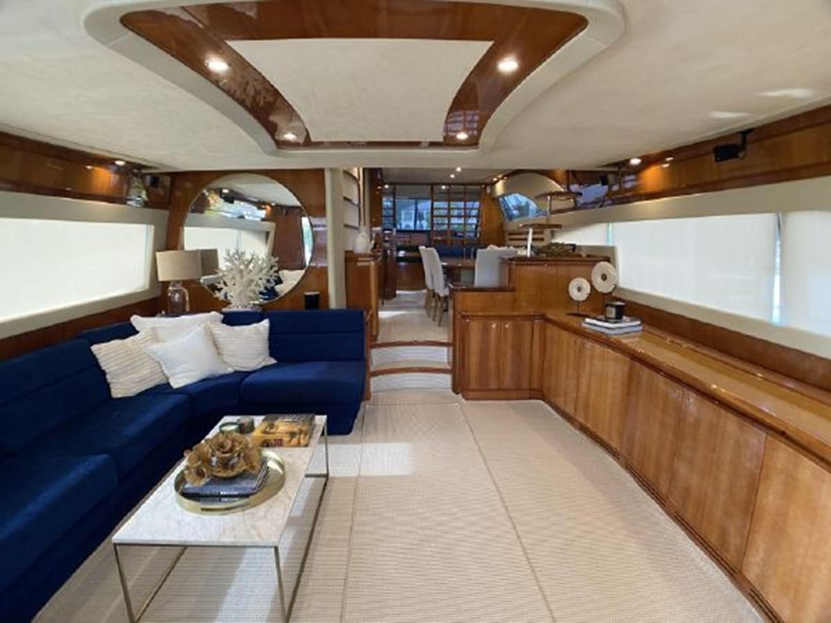 a large room with a bed and a couch aboard 2005 760 FERRETTI MOTOR YACHT Yacht for Sale