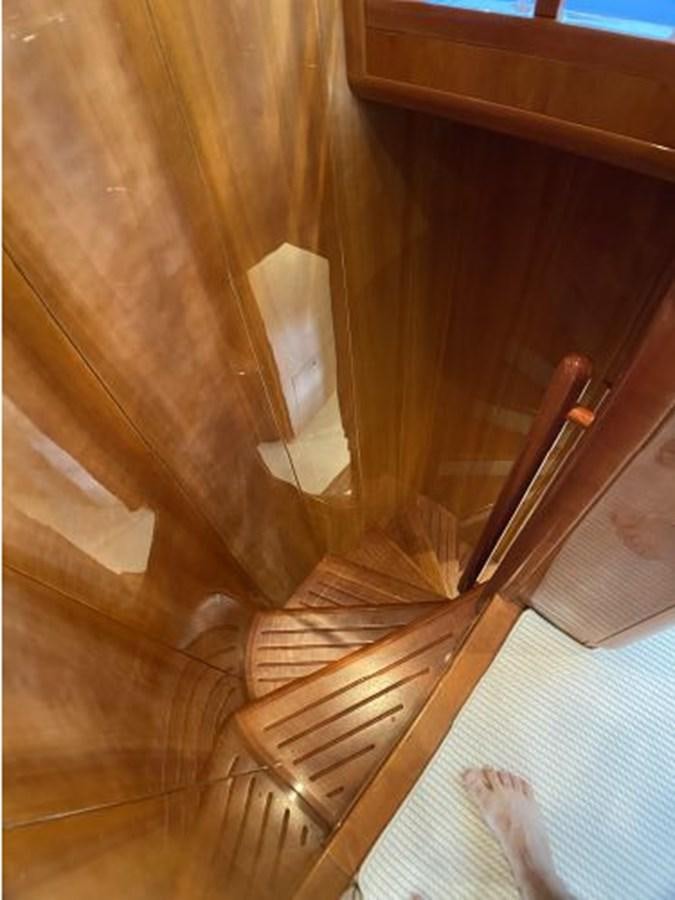a wooden staircase with a white towel from it aboard 2005 760 FERRETTI MOTOR YACHT Yacht for Sale
