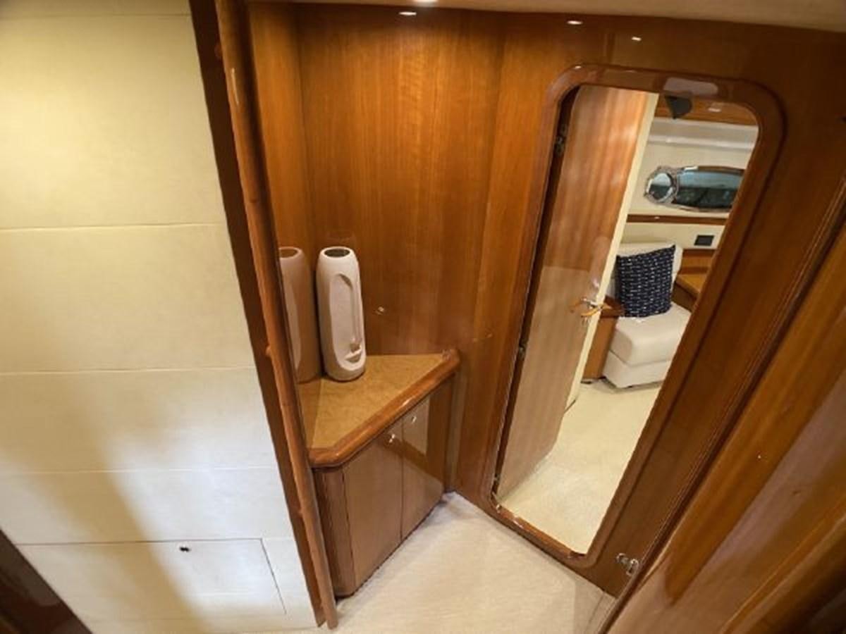 a bathroom with a mirror aboard 2005 760 FERRETTI MOTOR YACHT Yacht for Sale