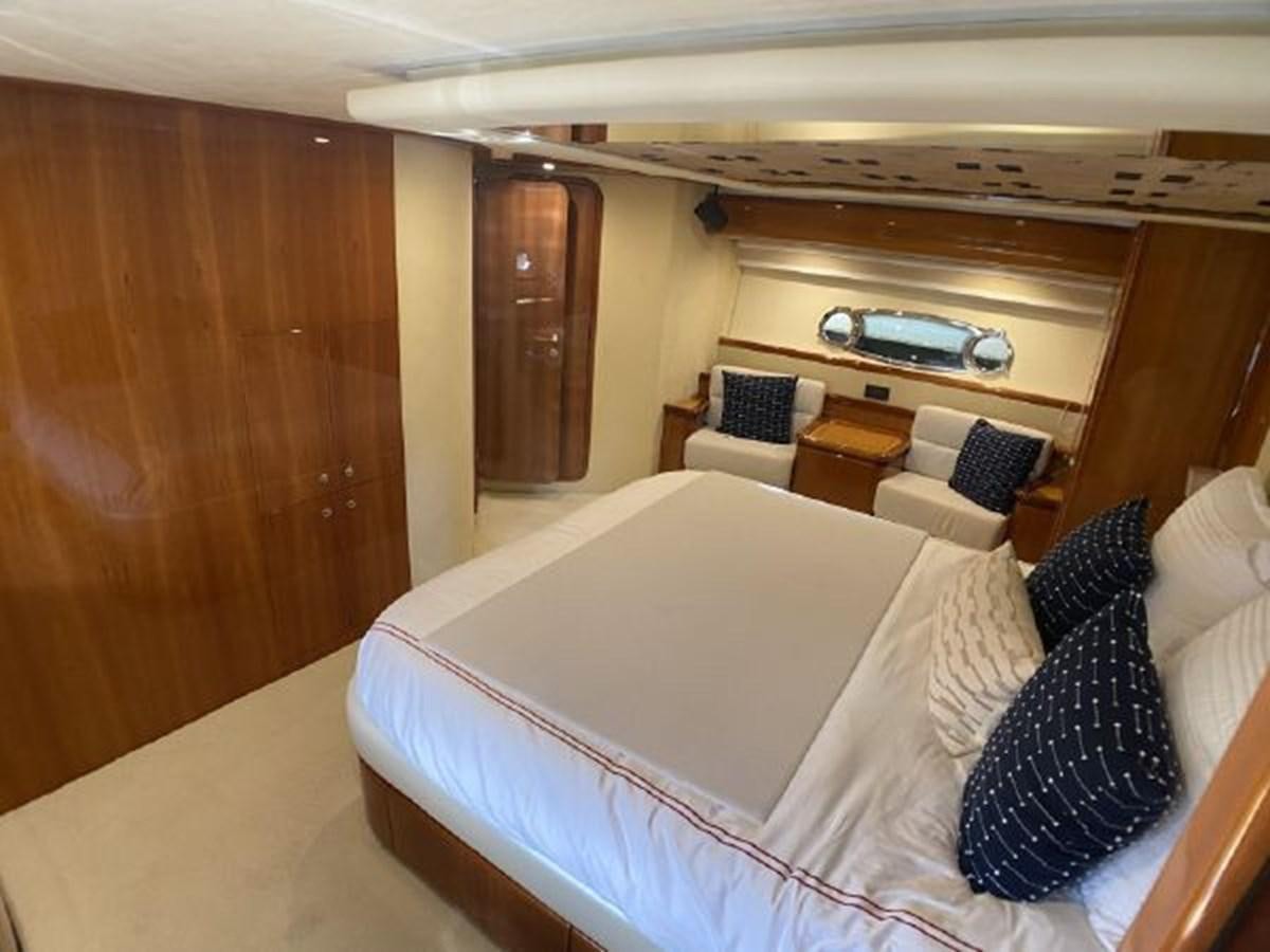 a bed in a room aboard 2005 760 FERRETTI MOTOR YACHT Yacht for Sale