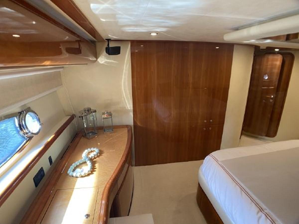 a bathroom with a sink and a bathtub aboard 2005 760 FERRETTI MOTOR YACHT Yacht for Sale