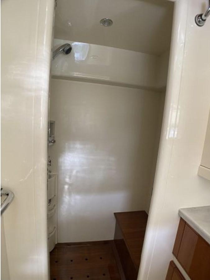 a white wall with a door aboard 2005 760 FERRETTI MOTOR YACHT Yacht for Sale