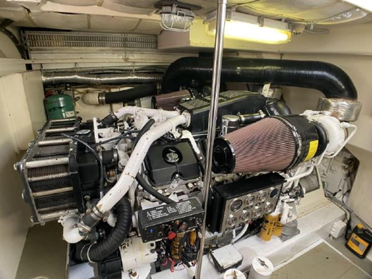 a car with a hood open aboard 2005 760 FERRETTI MOTOR YACHT Yacht for Sale