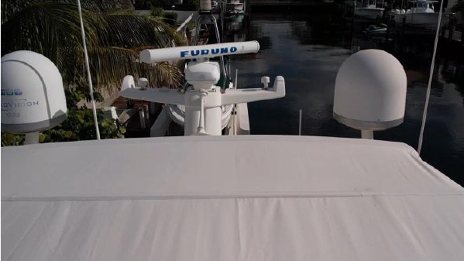 a white satellite on a white surface aboard 2005 760 FERRETTI MOTOR YACHT Yacht for Sale