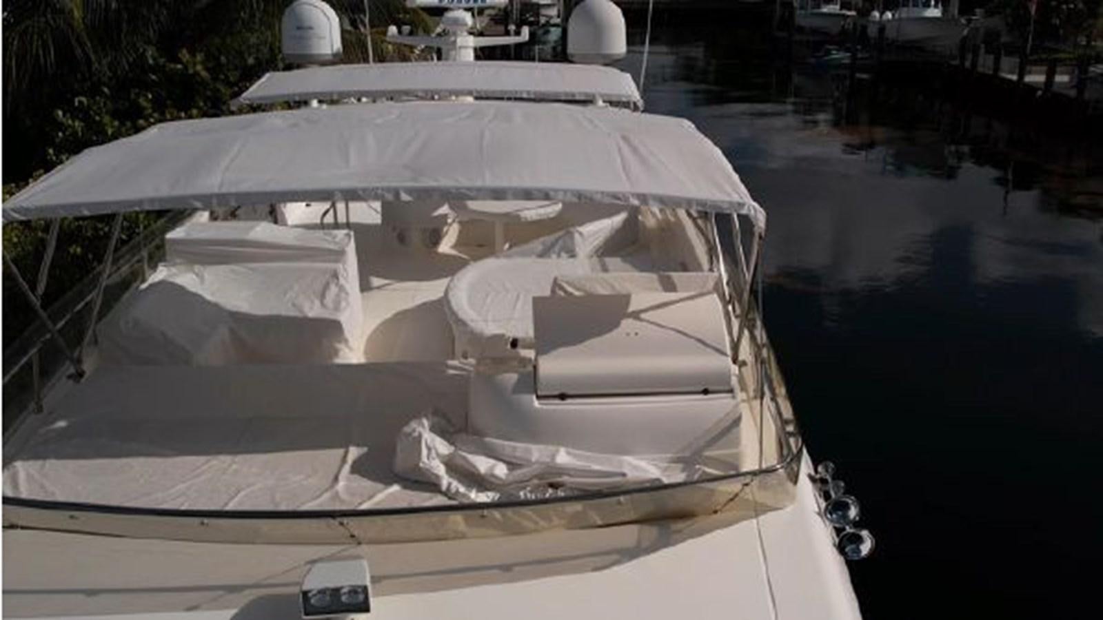 a boat with a cover on the front aboard 2005 760 FERRETTI MOTOR YACHT Yacht for Sale