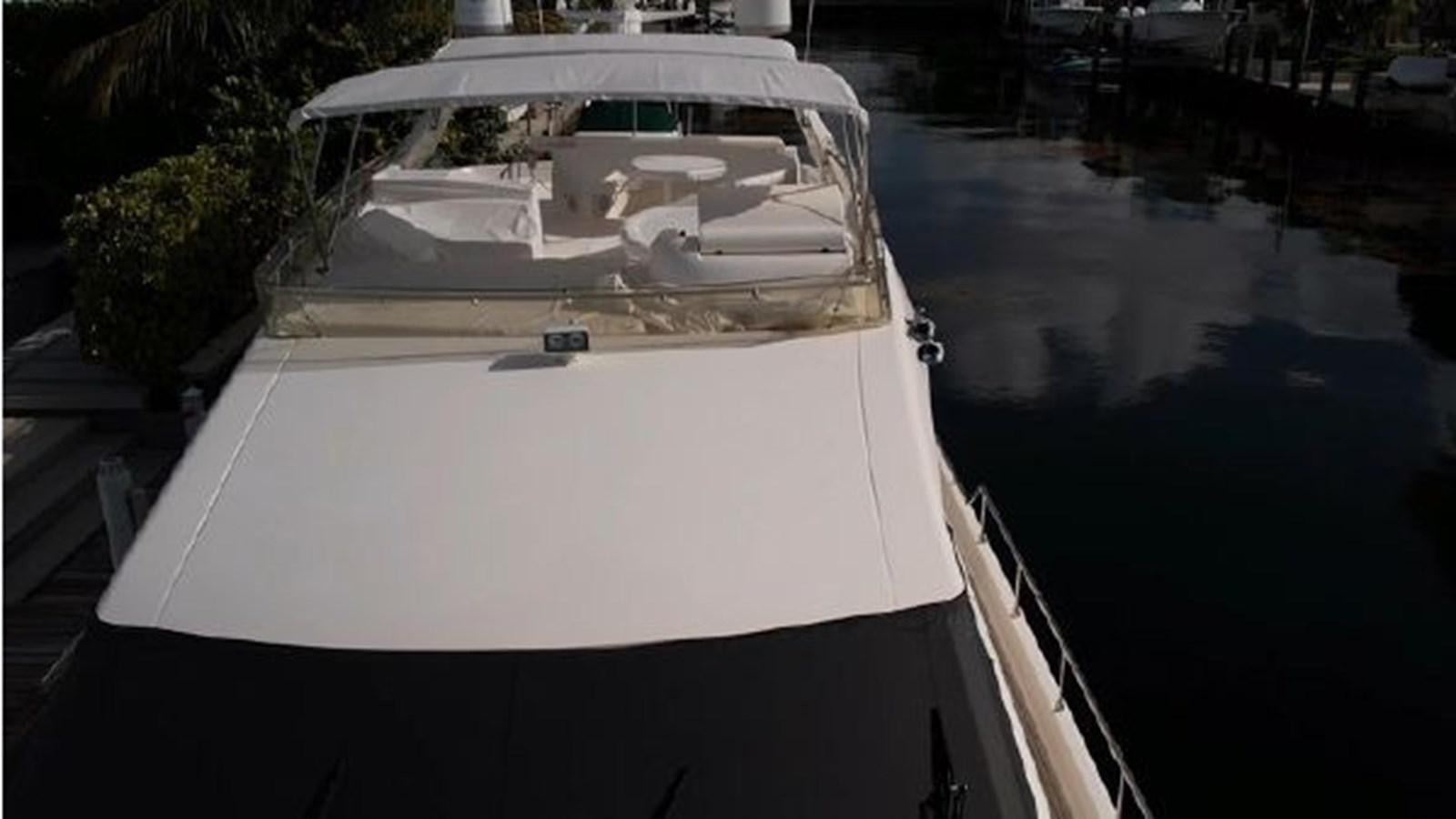 a white boat on the water aboard 2005 760 FERRETTI MOTOR YACHT Yacht for Sale
