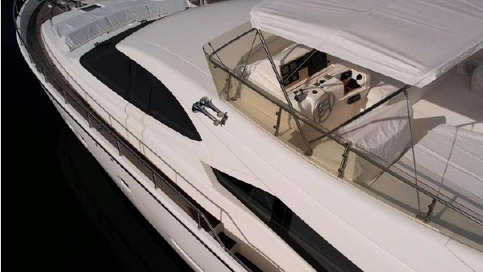 a high angle view of a car aboard 2005 760 FERRETTI MOTOR YACHT Yacht for Sale
